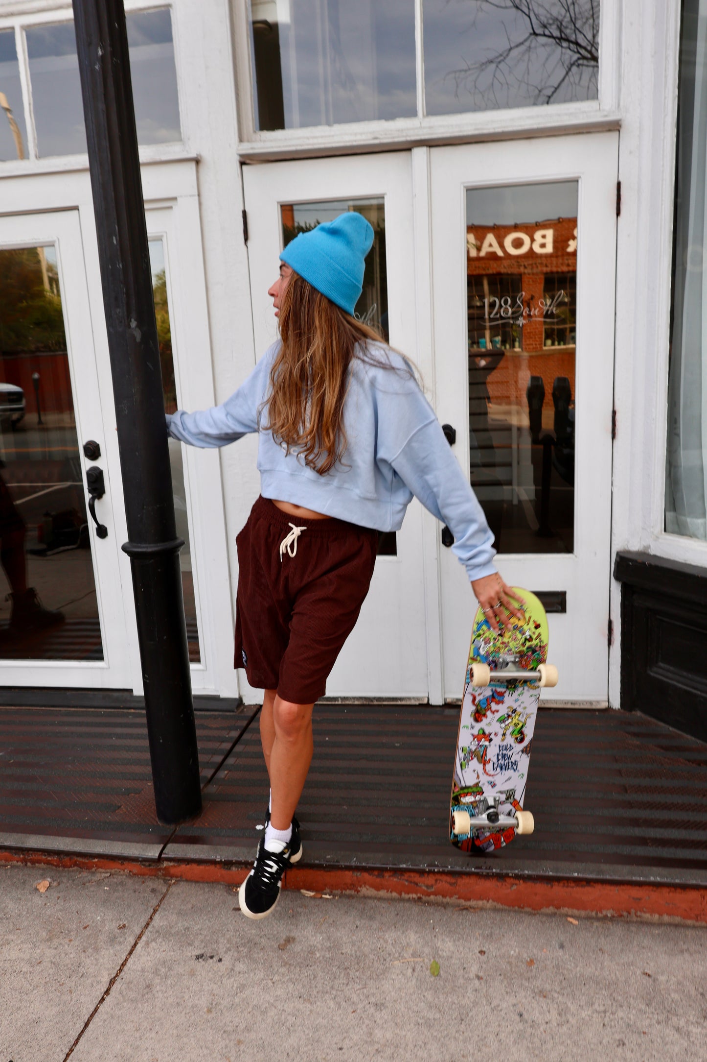 Cropped Kitty Scull Graphic Sweatshirt in Light Blue